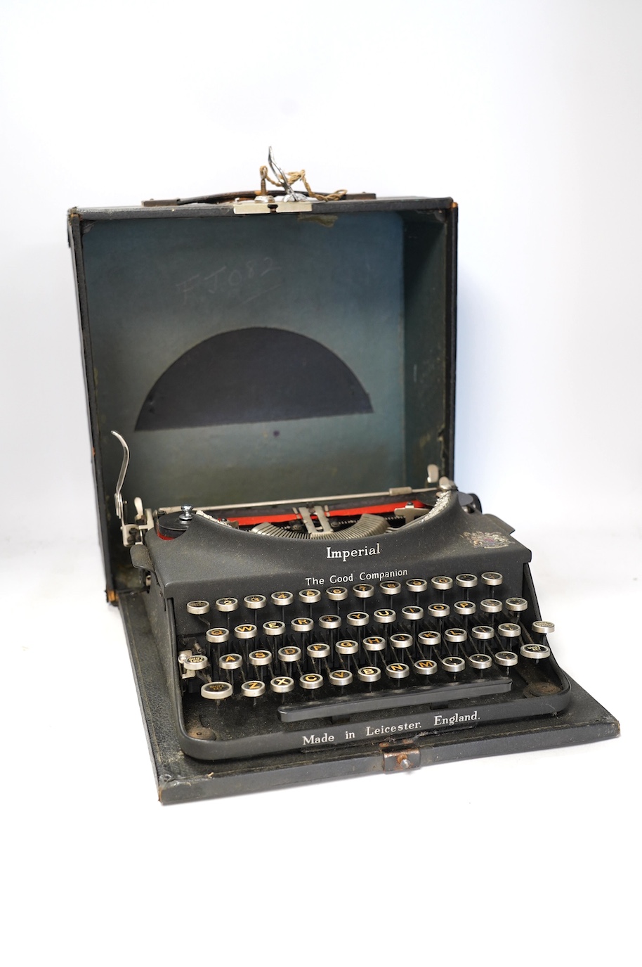 An Imperial portable typewriter, The Good Companion. Condition - poor to fair, some wear, minor damage and losses and surface rust to metal parts on the case